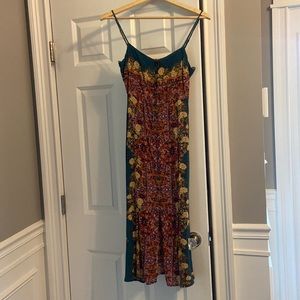 NEW with tags! This Free People stunning multi colored dress will turn heads!